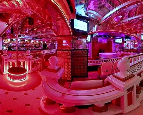 Inside Bagdad Barcelona nightclub interior and seating area