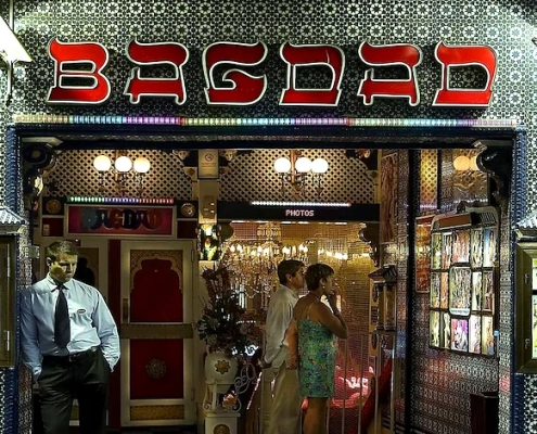 Entrance of Bagdad Barcelona nightclub with guests and doorman